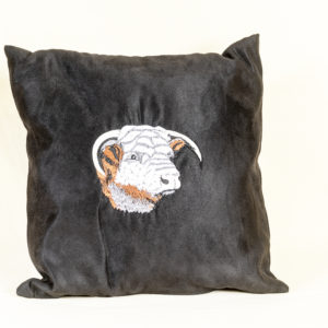 Whiterig faux suede cushion in black featuring embroidered bull's head