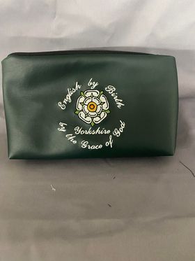 Whiterig washbag in green with Yorkshire rose embroidery